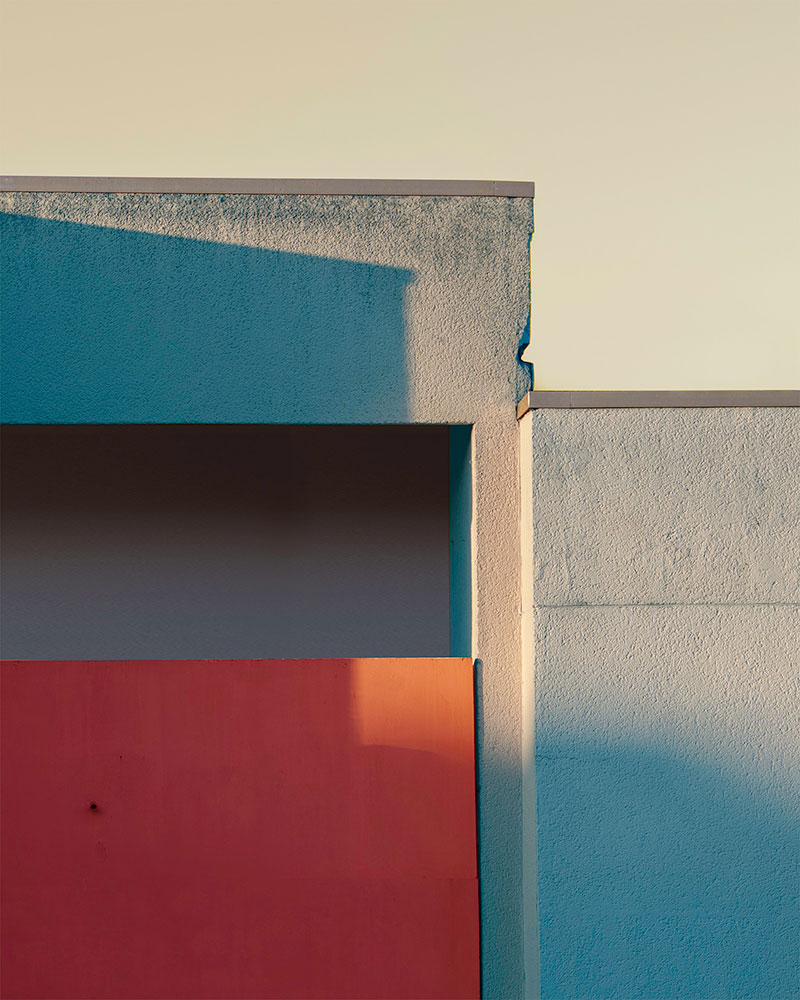 Facade detail with a red panel, colour-shifted, Berlin-Kreuzberg