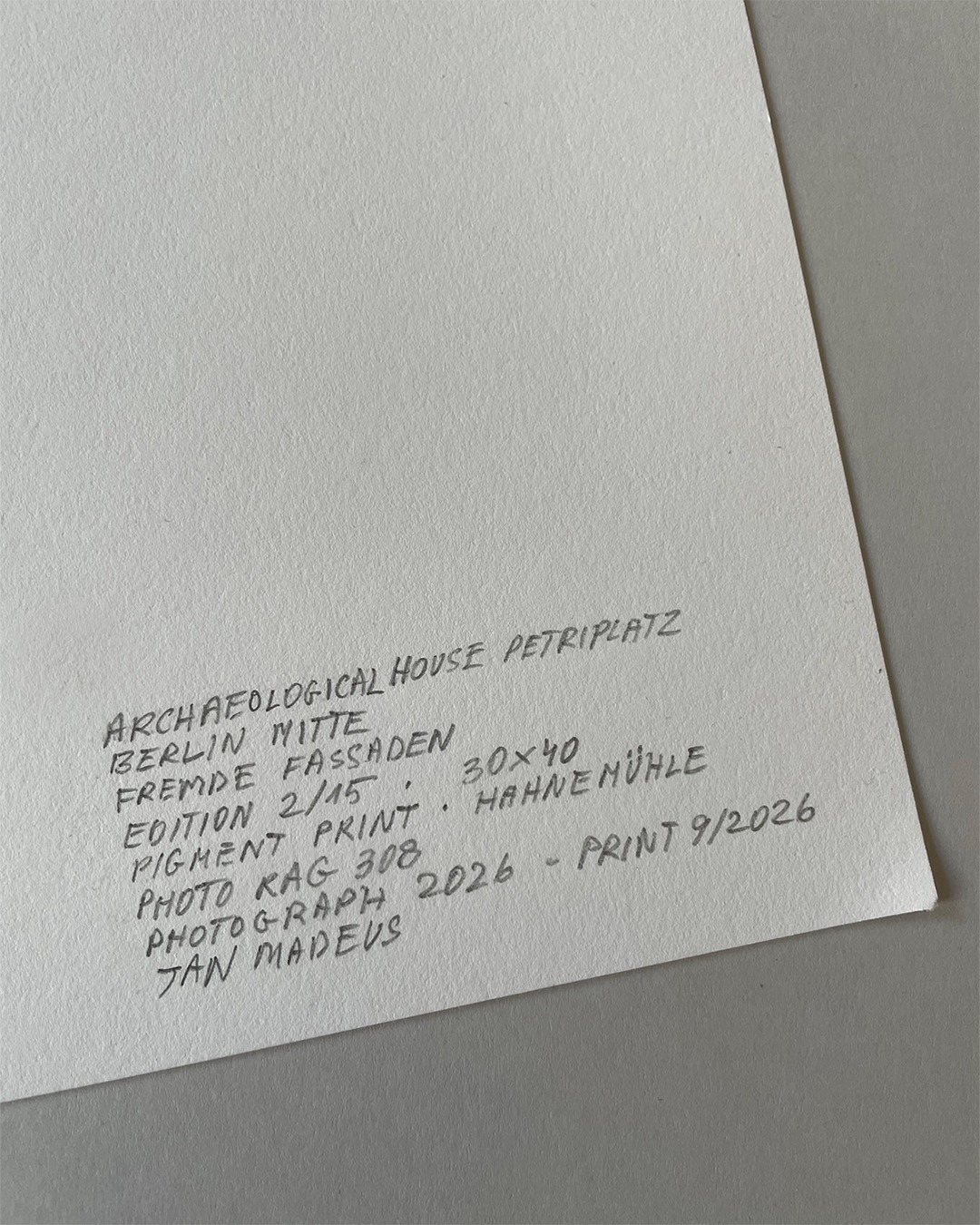 Back of a fine art print inscribed in pencil with title, series, edition 2 of 15, paper and date
